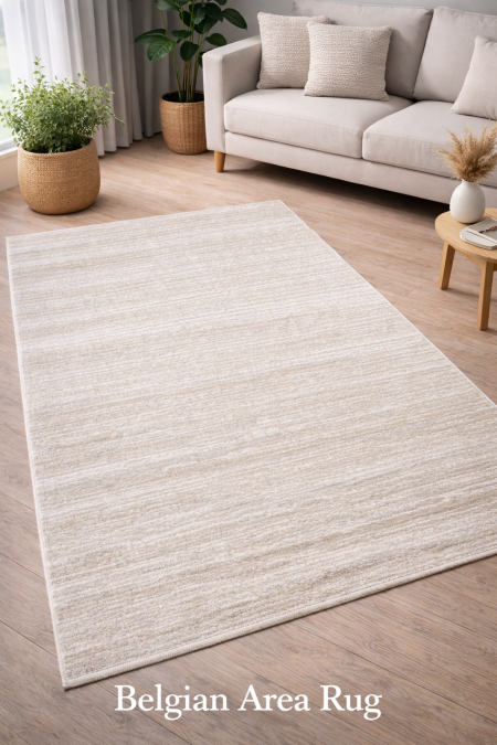 سجاد بلجيكي ناعم بتدرجات هادئة وتصميم بسيط، يمنح المكان إحساسًا بالراحة والأناقة. عملي، متين، ومناسب لجميع أنماط الديكور.