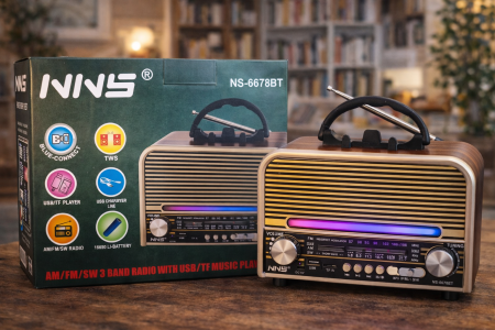 راديو NNS NS-6678BT بتصميم ريترو أنيق مع إضاءة LED جذابة، يدعم Bluetooth وTWS وتشغيل الموسيقى عبر USB وTF، مع استقبال AM / FM / SW وبطارية 18650 قابلة للشحن. عملي وسهل الحمل، مثالي للبيت أو الرحلات.