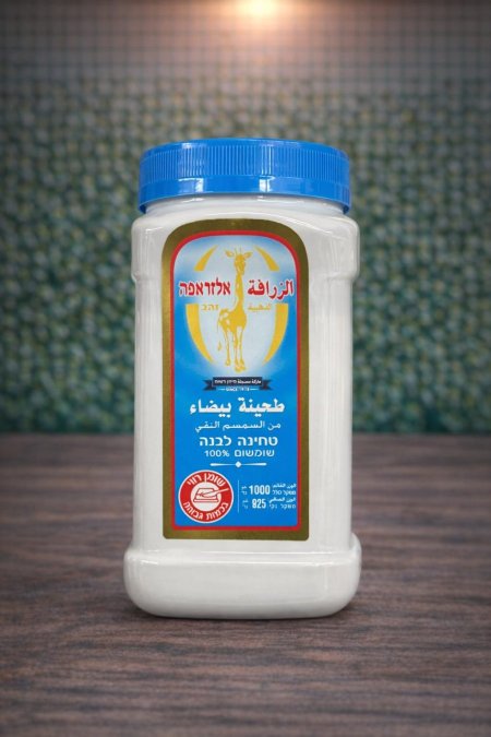 طحينة بيضاء نقية من السمسم الفاخر، بقوام كريمي وطعم غني للمقبلات والأطباق الشهية.